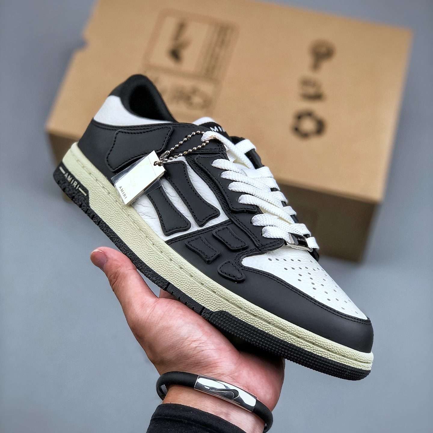 KICKWHO AMIRI Black Low Skel Top Sneaker